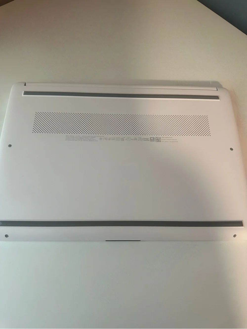 HP White Laptop with Silver Logo — Lightweight Design